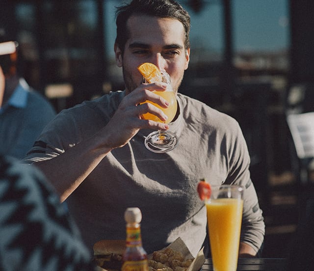 Man drinking beer.